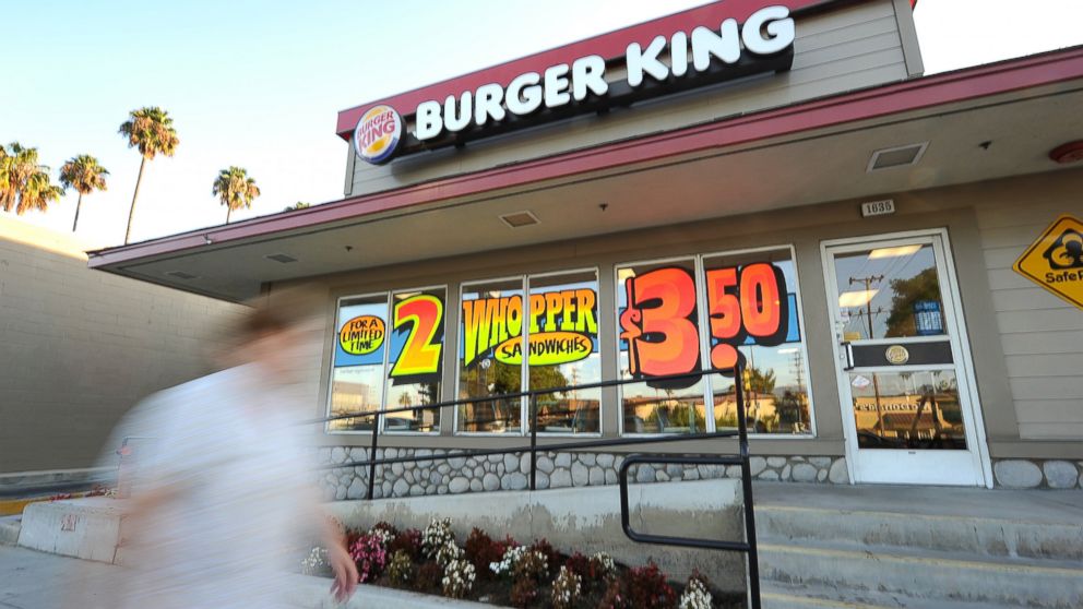 PHOTO: A man walks past a Burger King restaurant in Glendale, California on Sept. 2, 2010. 