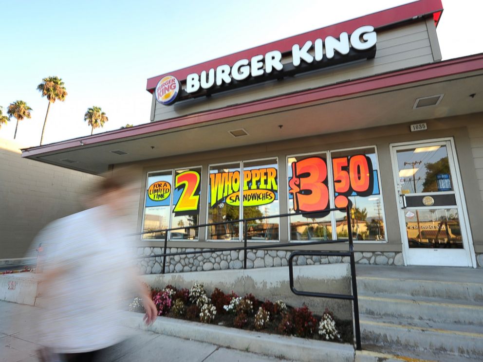 PHOTO: A man walks past a Burger King restaurant in Glendale, California on Sept. 2, 2010.
