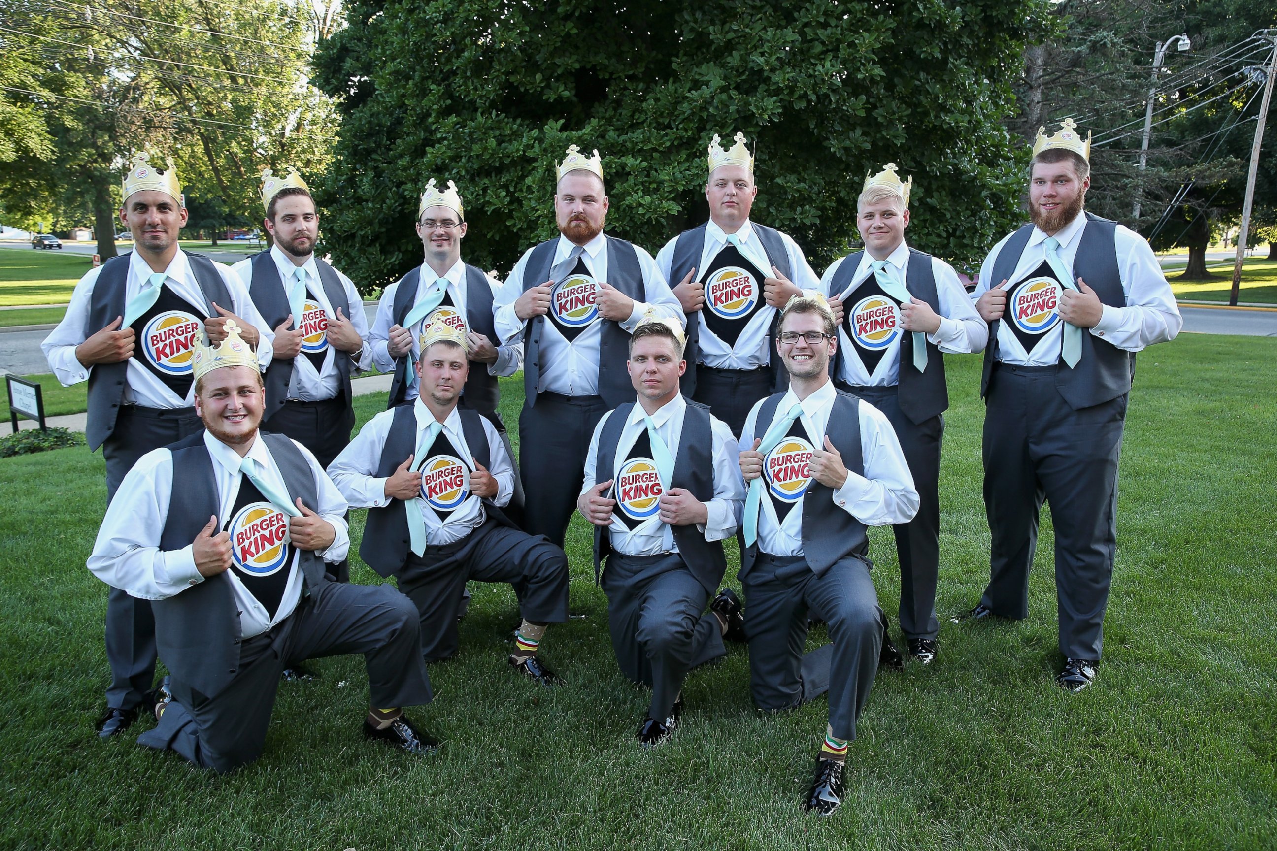 PHOTO: The groomsmen display their Burger King t-shirts at the wedding of Ashley King and Joel Burger on July 17, 2015 in Jacksonville, Ill. 