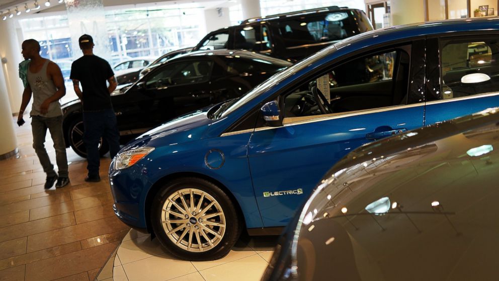 PHOTO: Cars sit on display at a Manhattan car dealership that sells Ford vehicles on July 24, 2013 in New York City.