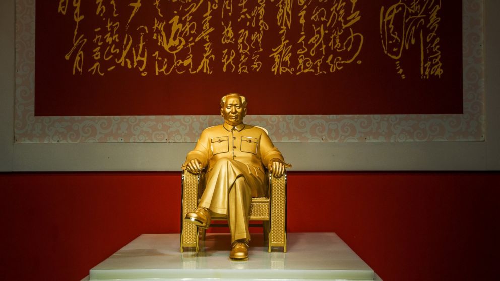 A gold and jade statue of former Chinese leader Chairman Mao Zedong is unveiled during the Art Shenzhen 2013 exhibition at Shenzhen Convention and Exhibition Center on December 13, 2013 in Shenzhen, China. 