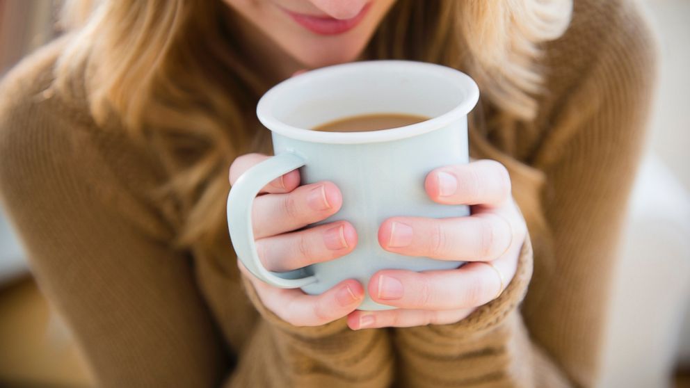 PHOTO:A woman is seen holding a coffee mug in this undated file photo. 