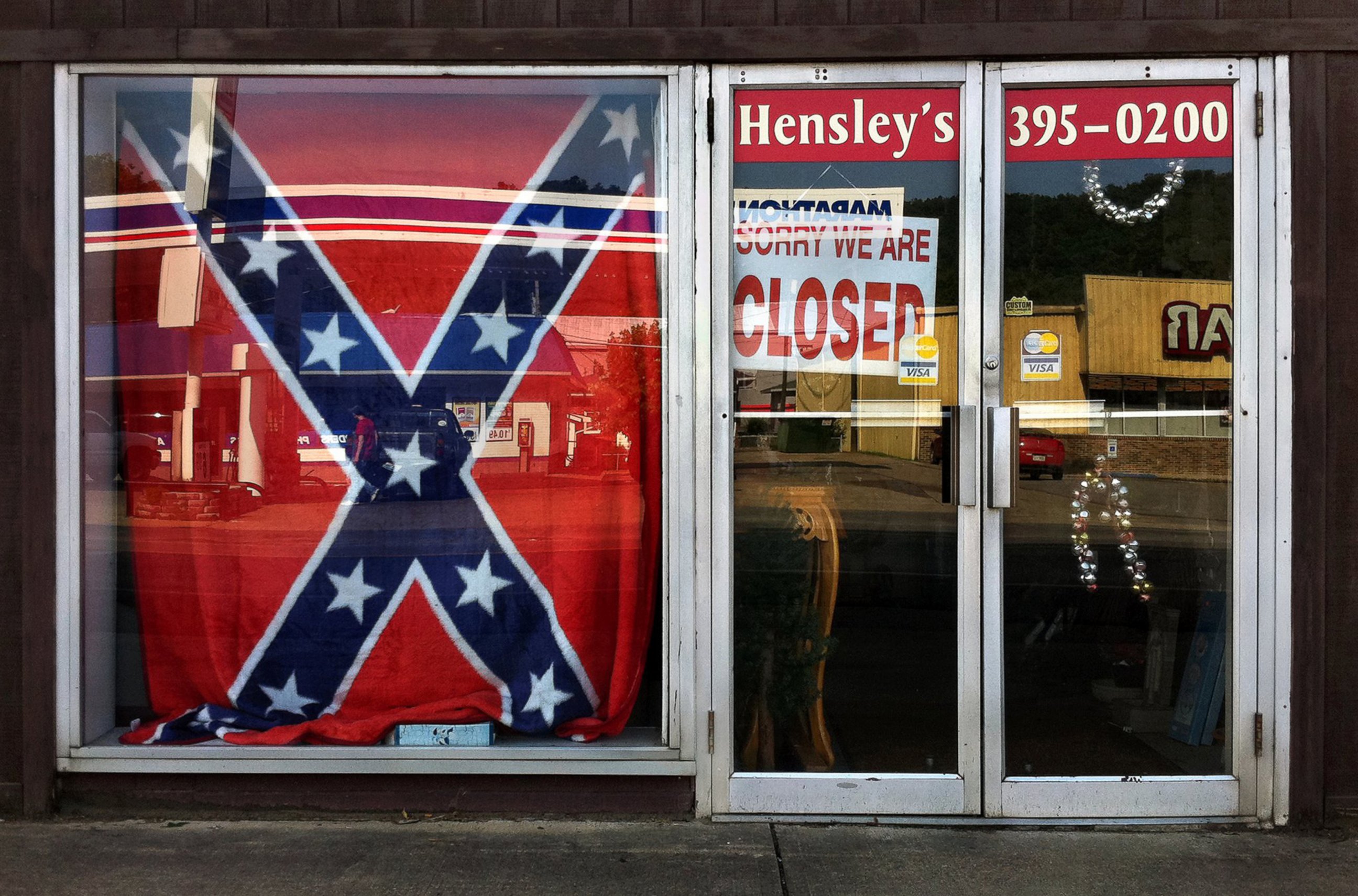 PHOTO: A Confederate flag covers a window of a store in a small town in Georgia on June 21, 2015.
