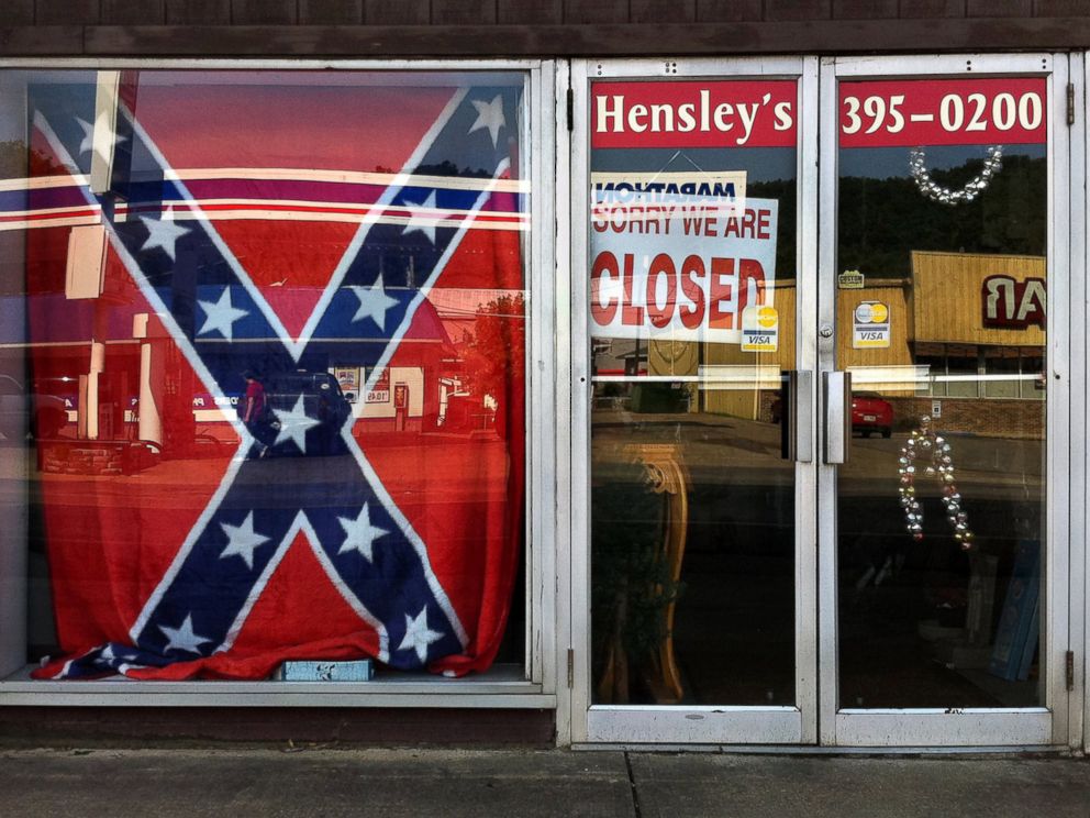 PHOTO: A Confederate flag covers a window of a store in a small town in Georgia on June 21, 2015.