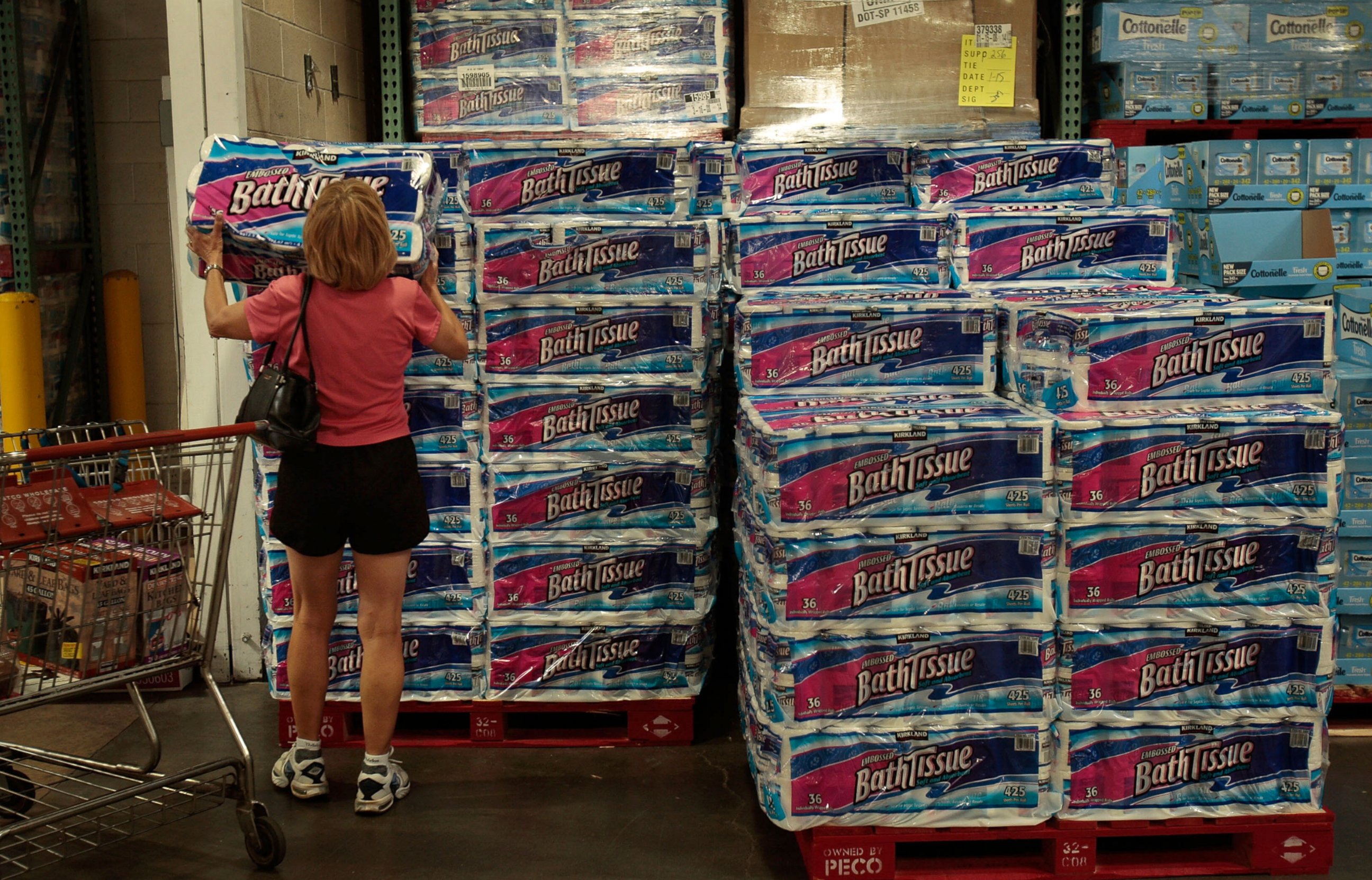 PHOTO: A shopper grabs a bulk package of toilet paper at a Costco store April 4, 2008 in Tucson, Ariz.