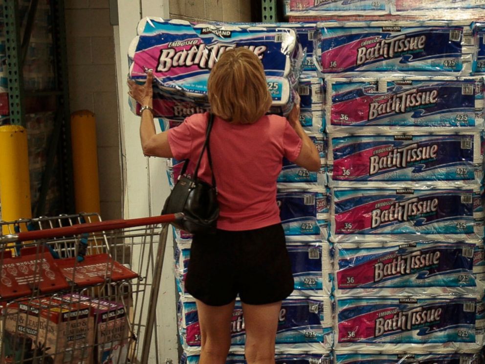 PHOTO: A shopper grabs a bulk package of toilet paper at a Costco store April 4, 2008 in Tucson, Ariz.