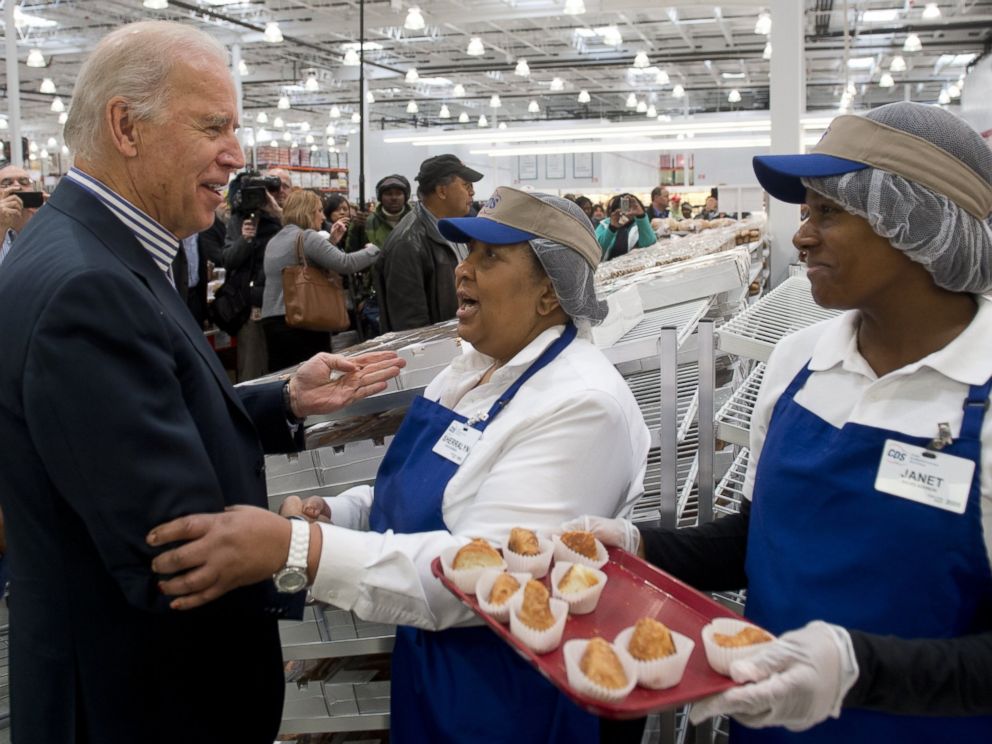 PHOTO: Vice President Joe Biden tries food samples during a visit to a Costco store on a shopping trip in Washington, DC, on Nov. 29, 2012.
