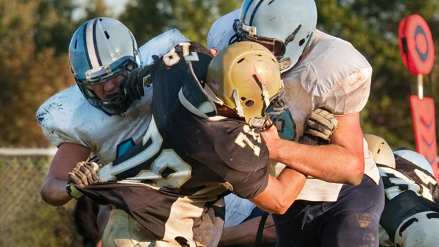 Football and Head Injuries: No Device Eliminates ...