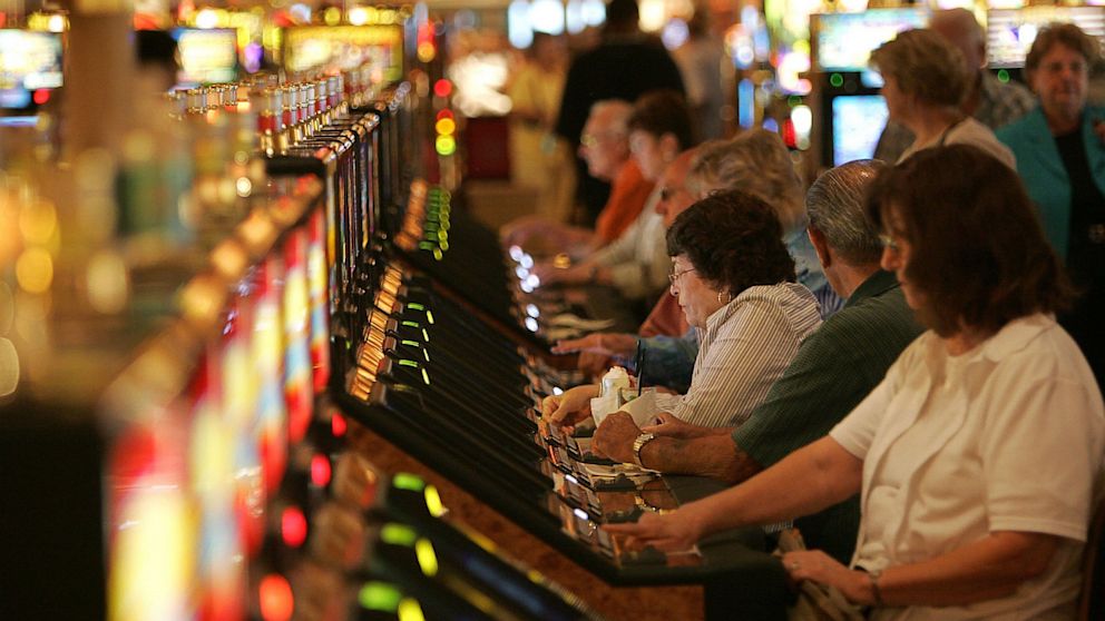 Gamblers play slot machines at the Beau Rivage Resort and Casino in Biloxi, Miss., in this Aug. 29, 2006 photo.