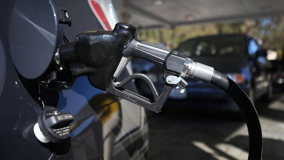 PHOTO: A gas pump nozzle sits in a car at a gas station in San Francisco, Calif.