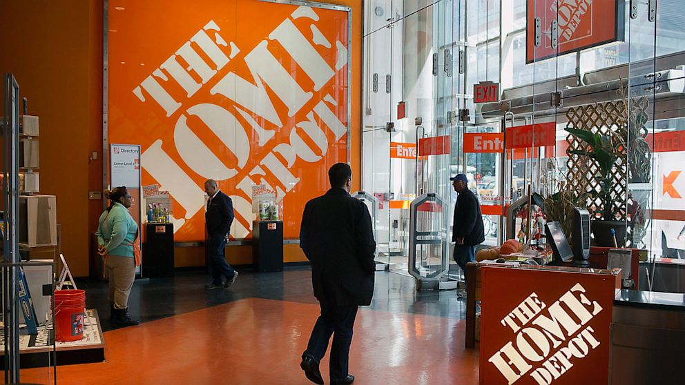 Customers are shown at a Home Depot store in New York, in this Oct. 16, 2012 photo.