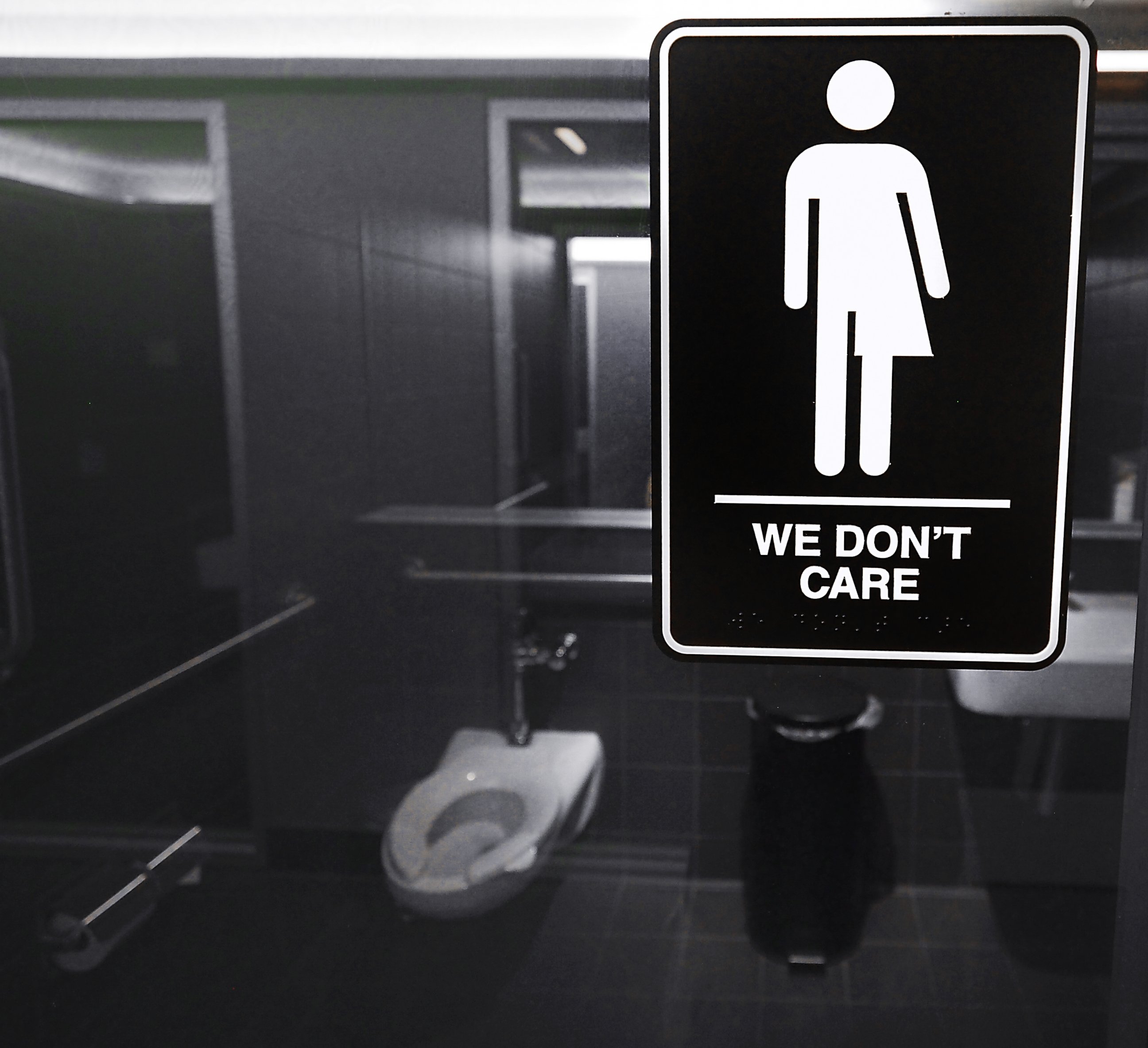 PHOTO: Gender neutral signs are posted in the 21C Museum Hotel public restrooms on May 10, 2016 in Durham, North Carolina.