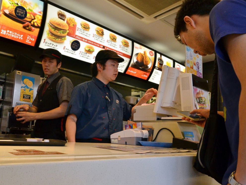 PHOTO: A customer orders food at a McDonalds restaurant in Tokyo, July 25, 2014.