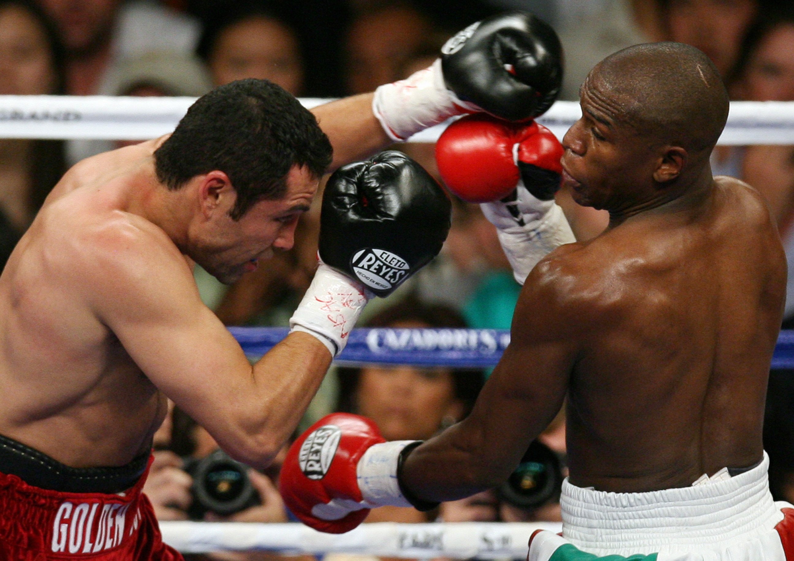 PHOTO: Oscar De La Hoya fights with Floyd Mayweather during their WBC Super Welterweight World Championship, in Las Vegas, Nevada, May 5, 2007. 