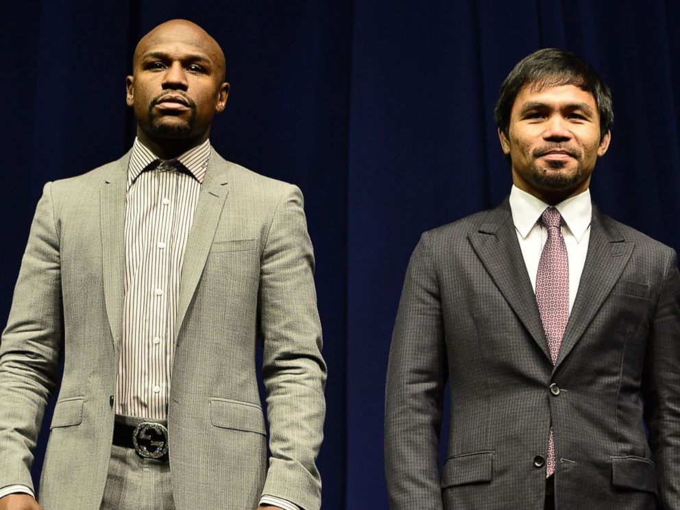 PHOTO: Floyd Mayweather and Manny Pacquiao attend a press conference at Nokia Theatre L.A. Live on March 11, 2015 in Los Angeles, Calif.  