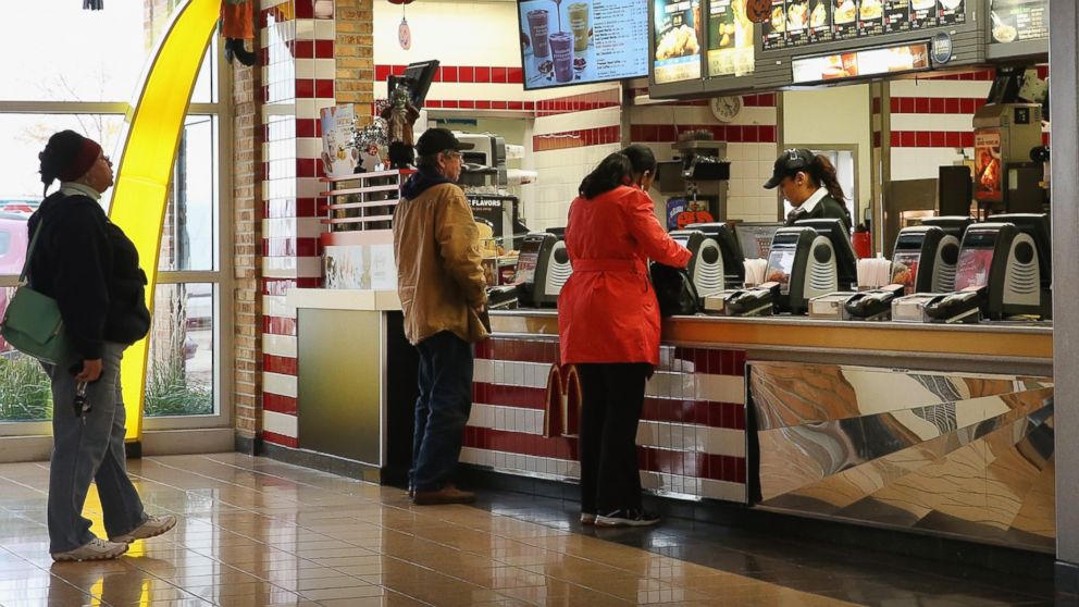 PHOTO: Customers order food from a McDonald's restaurant on Oct. 24, 2013 in Des Plaines, Ill.
