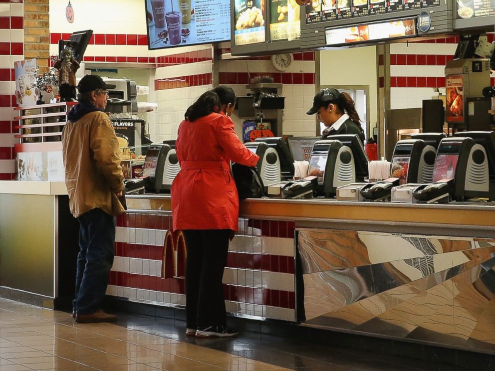 PHOTO: Customers order food from a McDonalds restaurant on Oct. 24, 2013 in Des Plaines, Ill.
