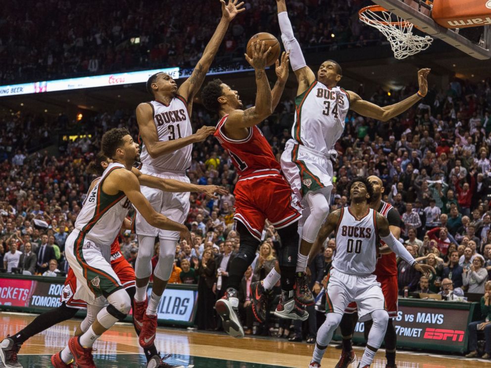 PHOTO: Derrick Rose of the Chicago Bulls shoots against guard Giannis Antetokounmpo #34 of the Milwaukee Bucks during game three of the NBA Playoffs, April 23, 2015 in Milwaukee, Wis.