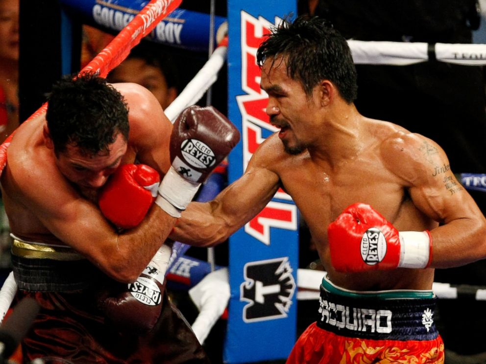 PHOTO: Manny Pacquiao of the Philippines fights Oscar De La Hoya during their welterweight match  at the MGM Grand Garden Arena, Dec. 6, 2008 in Las Vegas, Nev.