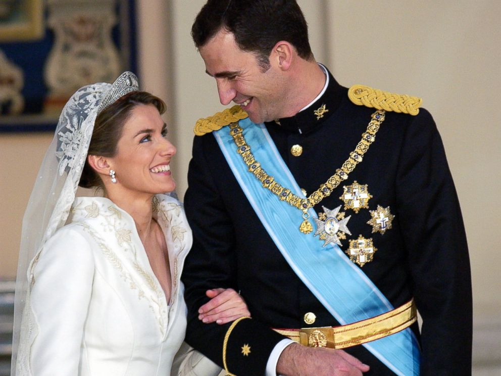 PHOTO: Crown Prince Felipe Of Spain, Prince Of The Asturias, laughing with his bride Crown Princess Letizia in the royal palace after their wedding, May 22, 2004.