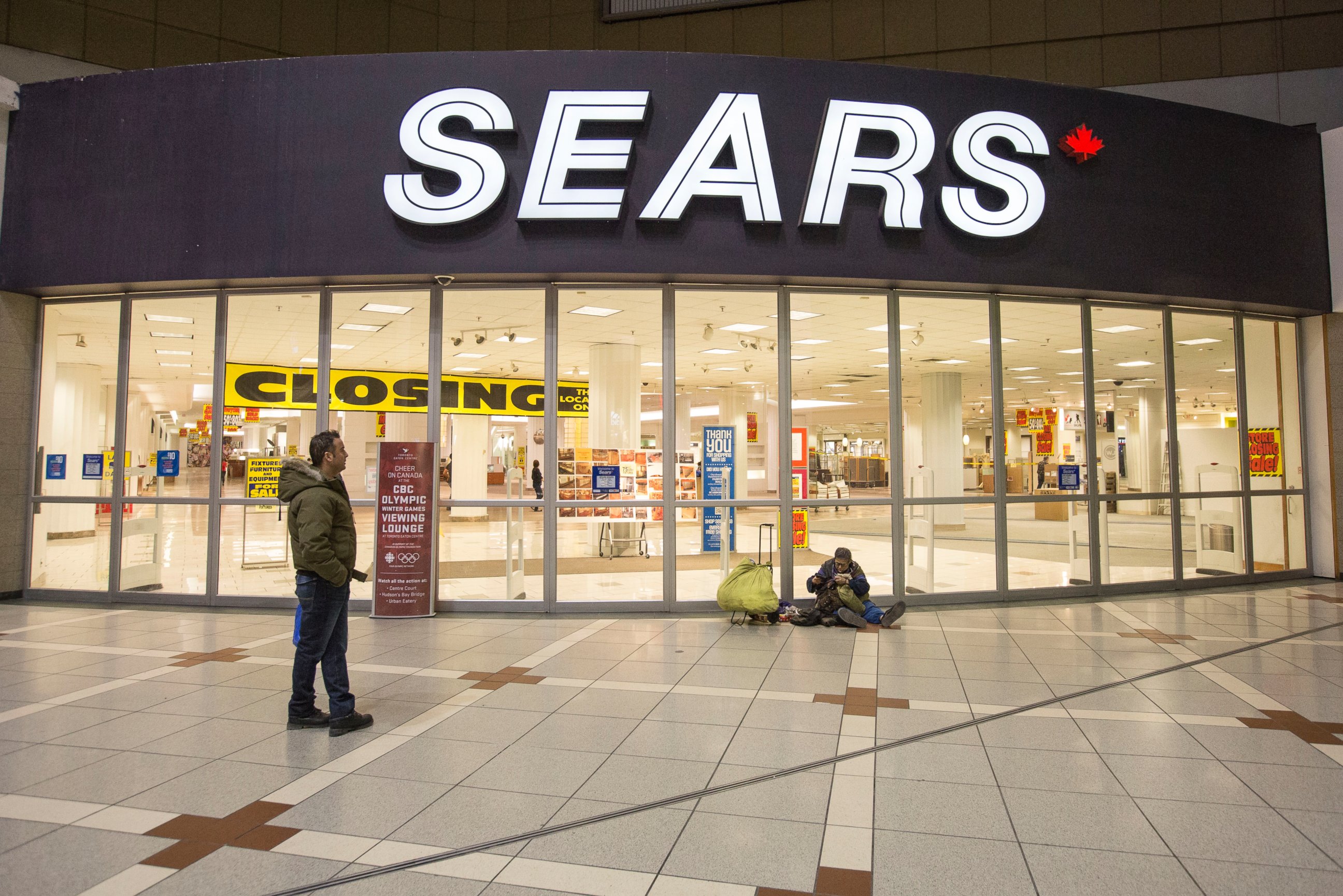 PHOTO: The doors of the Sears at the Eaton Centre mall are seen closed for the last time on Feb. 23, 2014 in Toronto.