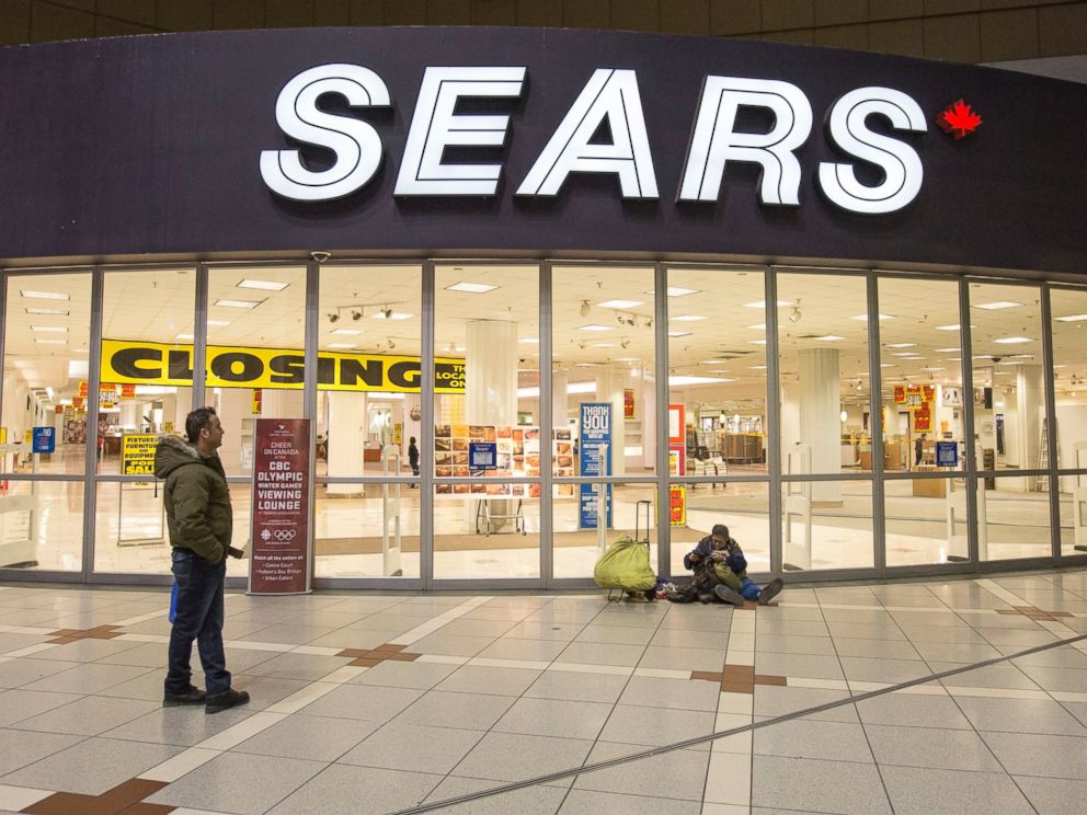 PHOTO: The doors of the Sears at the Eaton Centre mall are seen closed for the last time on Feb. 23, 2014 in Toronto.
