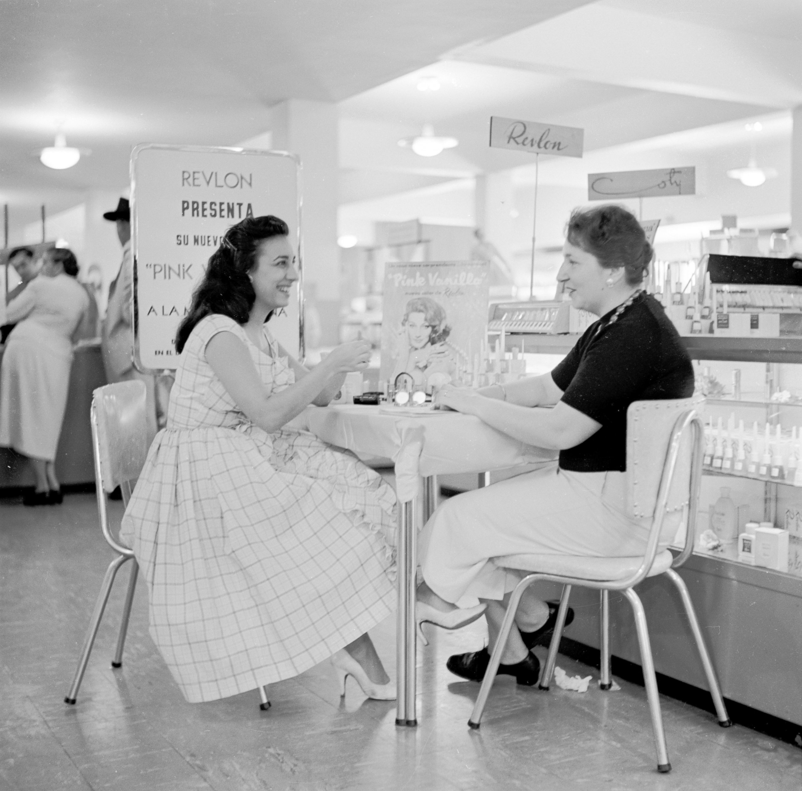 PHOTO: A customer receives a cosmetic consultation in Sears Roebuck department store in Caracas, Venezuela, circa 1955.