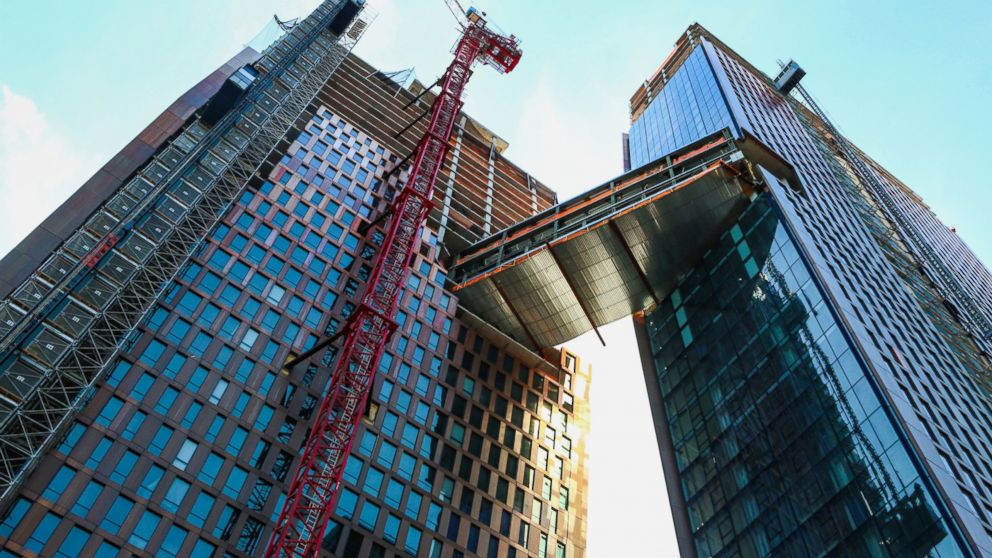 PHOTO: The American Copper Buildings with skybridge stands under construction in New York, April 19, 2016.