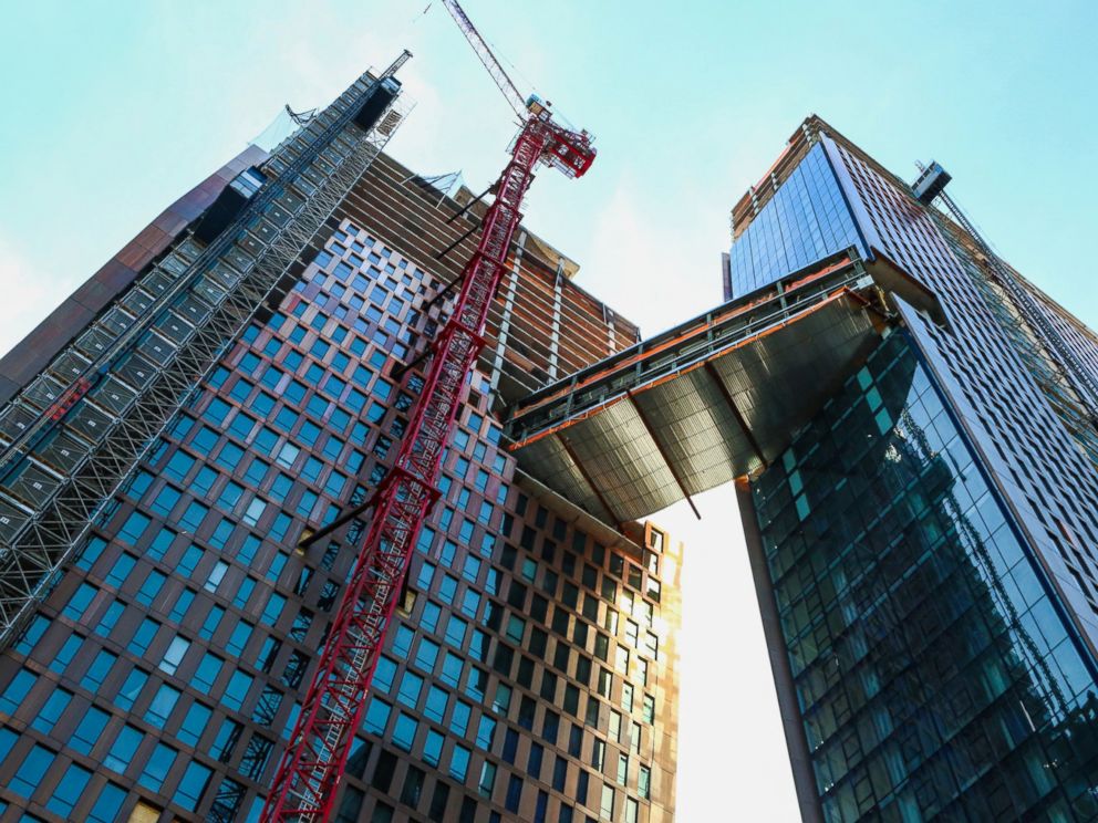 PHOTO: The American Copper Buildings with skybridge stands under construction in New York, April 19, 2016.
