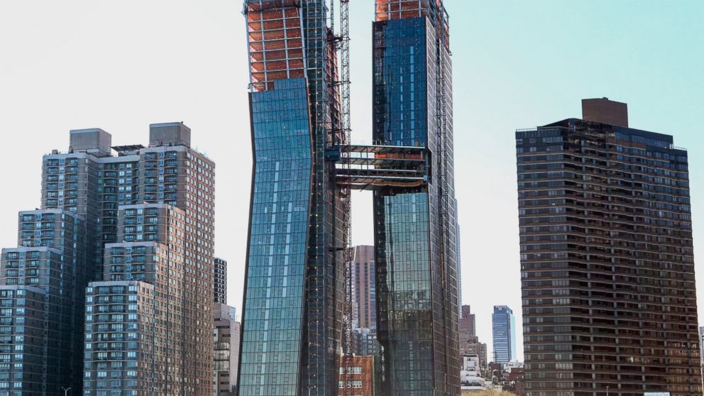 The American Copper Buildings with skybridge stands under construction in New York, April 19, 2016.