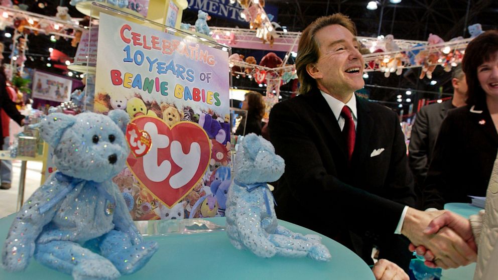 In a rare public appearance, Beanie Babies creator Ty Warner shakes hands with attendees at the American International Toy Fair, Feb. 16, 2003, in New York.