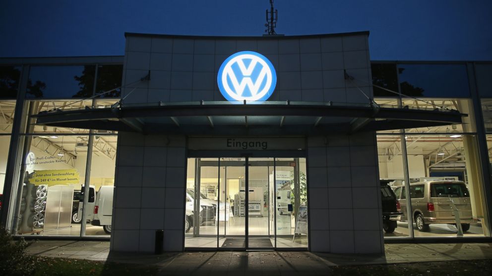 A Volkswagen dealership stands at night, Oct. 6, 2015, in Berlin.