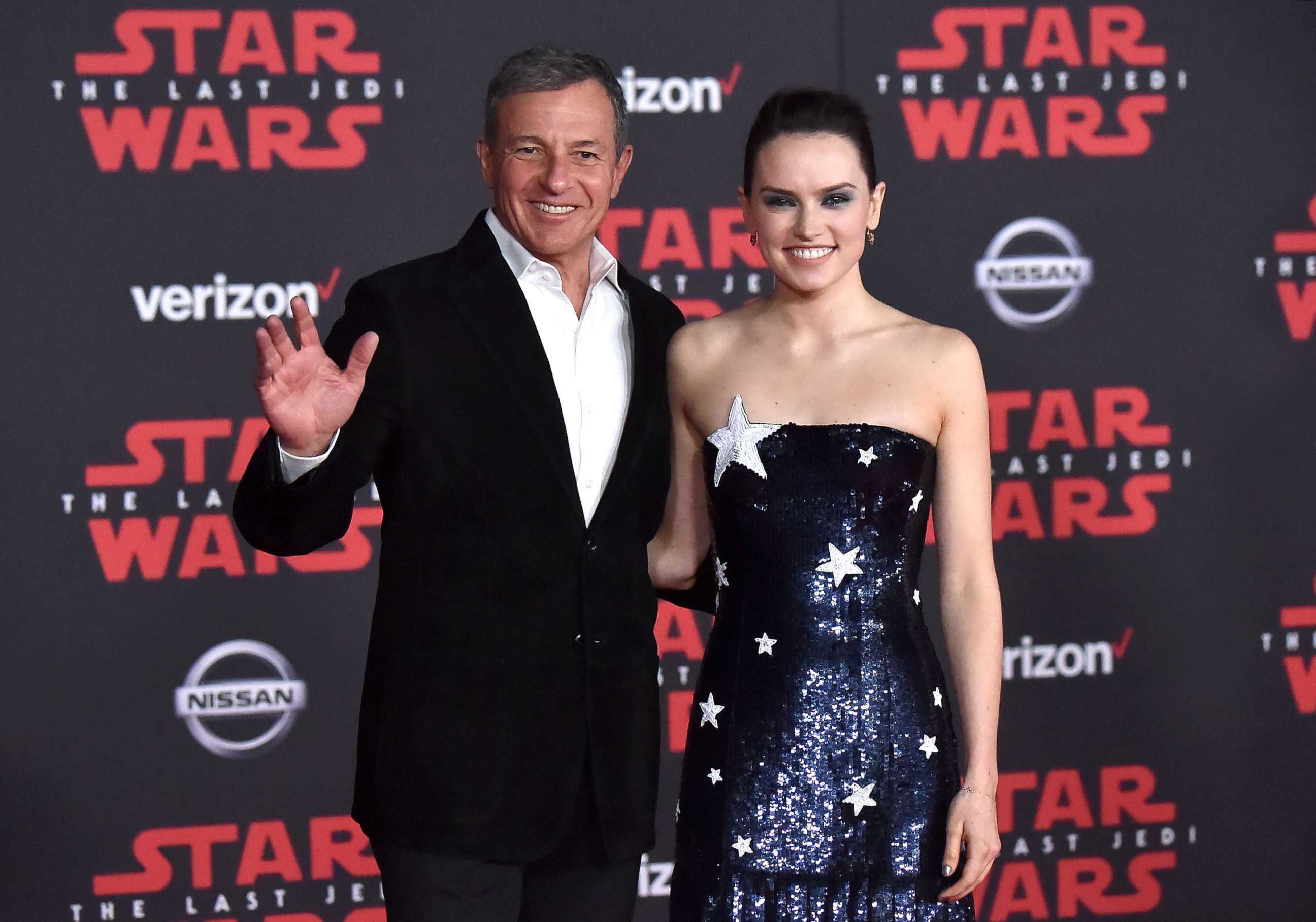 PHOTO: Walt Disney Company Chairman/CEO Robert Iger (L) and Daisy Ridley attend the premiere of Disney Pictures and Lucasfilm's "Star Wars: The Last Jedi" at The Shrine Auditorium on December 9, 2017 in Los Angeles, California.  