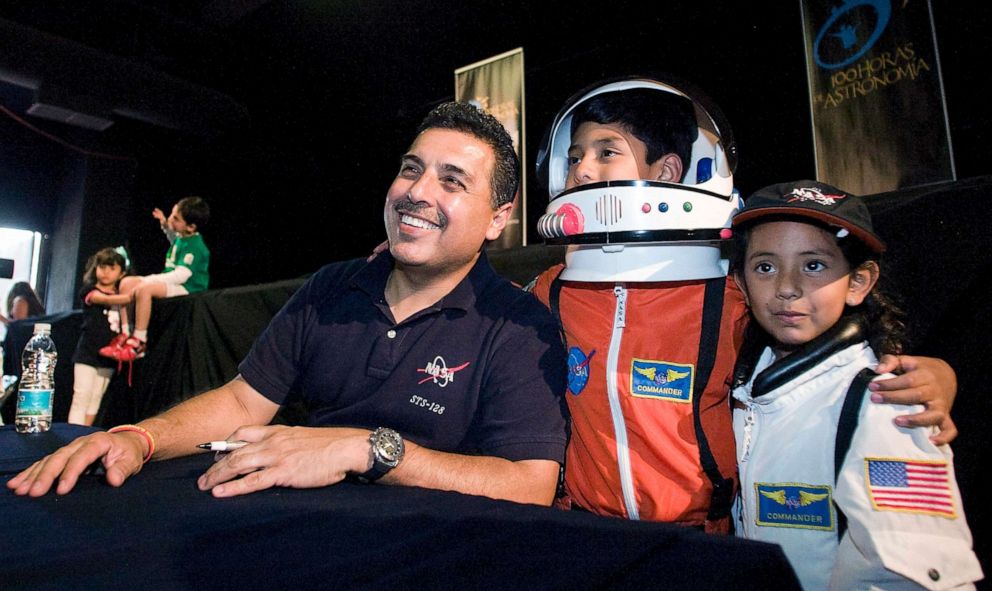 PHOTO: Former Mexican astronaut Jose Hernandez poses for a photo with young fans at Universum Museum, April 28, 2011, in Mexico City, Mexico.