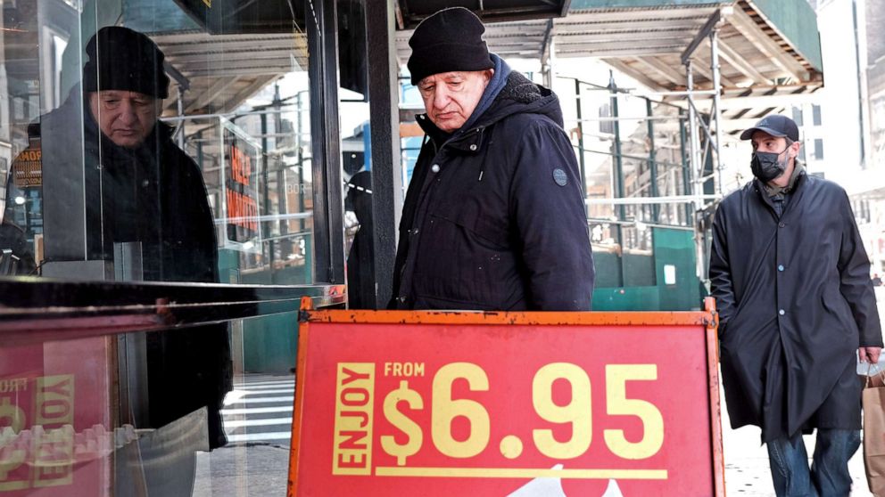 PHOTO: Prices are displayed outside of a Manhattan business on Jan. 12, 2022 in New York City. Newly released data shows that inflation growth, as prices rose on everything from gas to furniture for American shoppers.