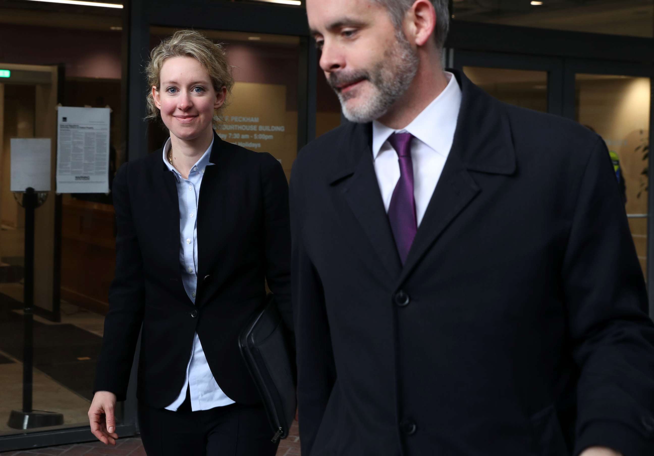 PHOTO: Former Theranos founder and CEO Elizabeth Holmes (L) leaves the Robert F. Peckham U.S. Federal Court, Jan. 14, 2019, in San Jose, Calif.