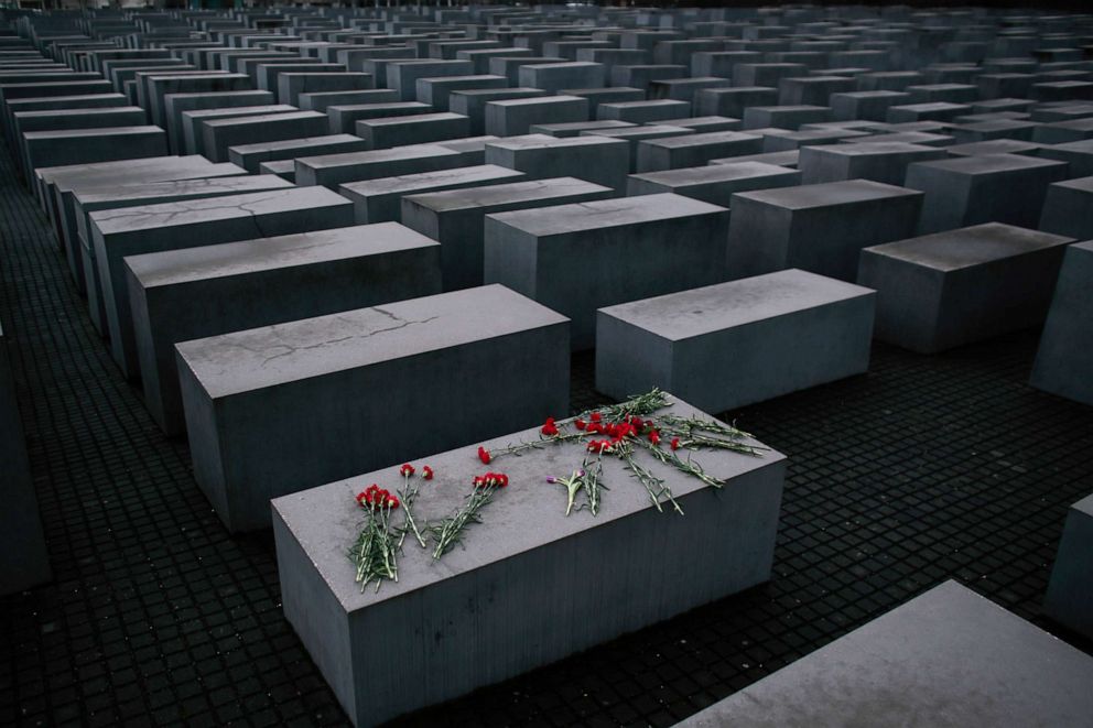 PHOTO: Flowers lay on a concrete slab of the Holocaust Memorial to mark the International Holocaust Remembrance Day in Berlin, Jan. 27, 2015.