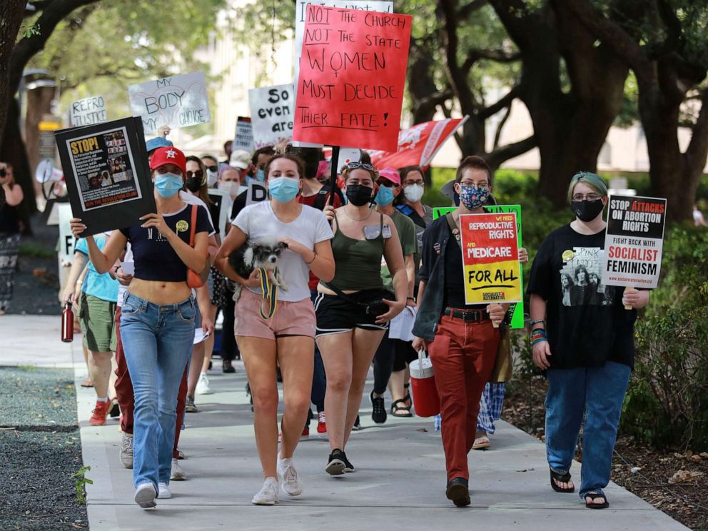 PHOTO: Protestors march from City Hall to the federal court house in protest of the new state abortion ban in Houston, Sept. 5, 2021.