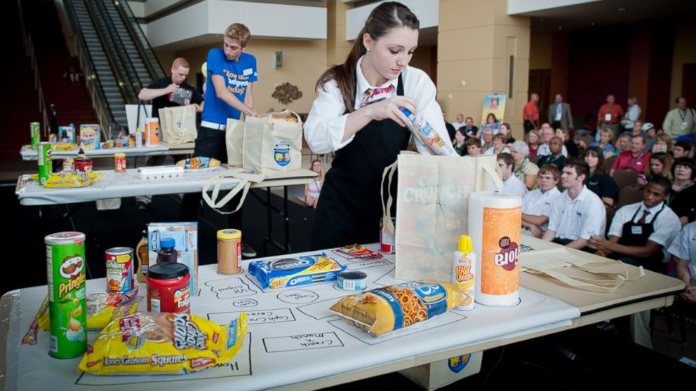 Contestants compete in this past National Grocers Association Best Bagger Championship.