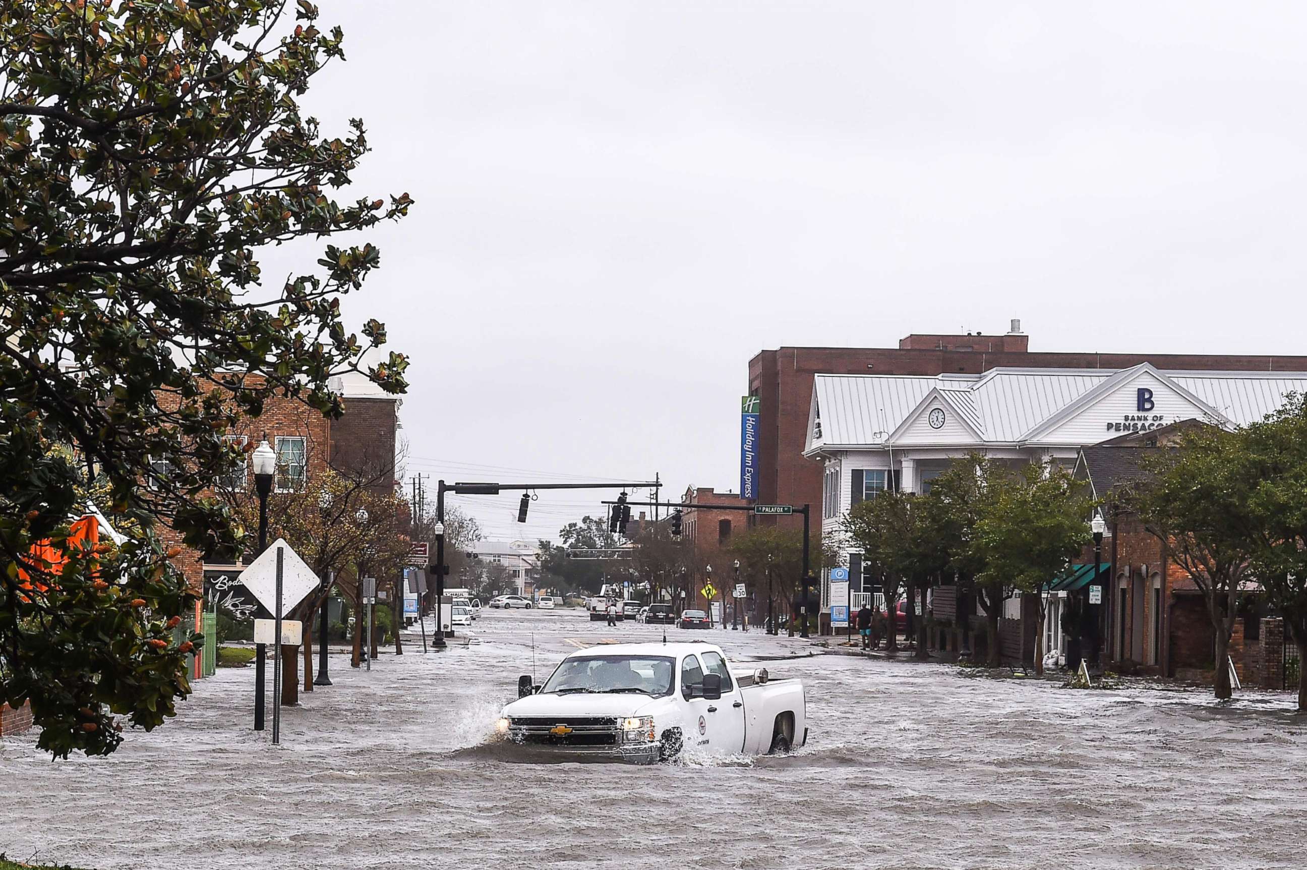 PHOTO: A city worker drives through the flooded street during Hurricane Sally in downtown Pensacola, Florida on Sept. 16, 2020.