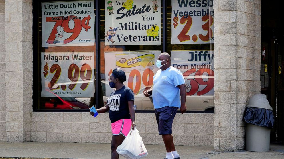 PHOTO: Shoppers leave a Piggly Wiggly supermarket in Columbus, Ga., Sept. 8, 2020. 