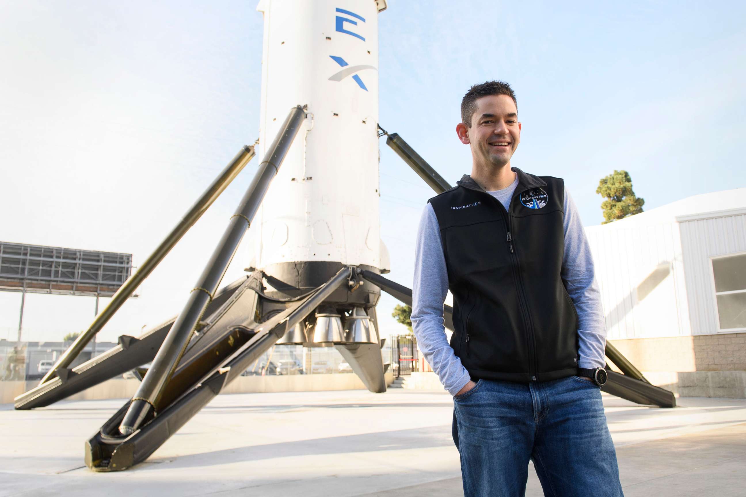 PHOTO: Inspiration4 mission commander Jared Isaacman, founder and chief executive officer of Shift4 Payments, stands in front of the recovered first stage of a Falcon 9 rocket at SpaceX, Feb. 2, 2021 in Hawthorne, Calif.