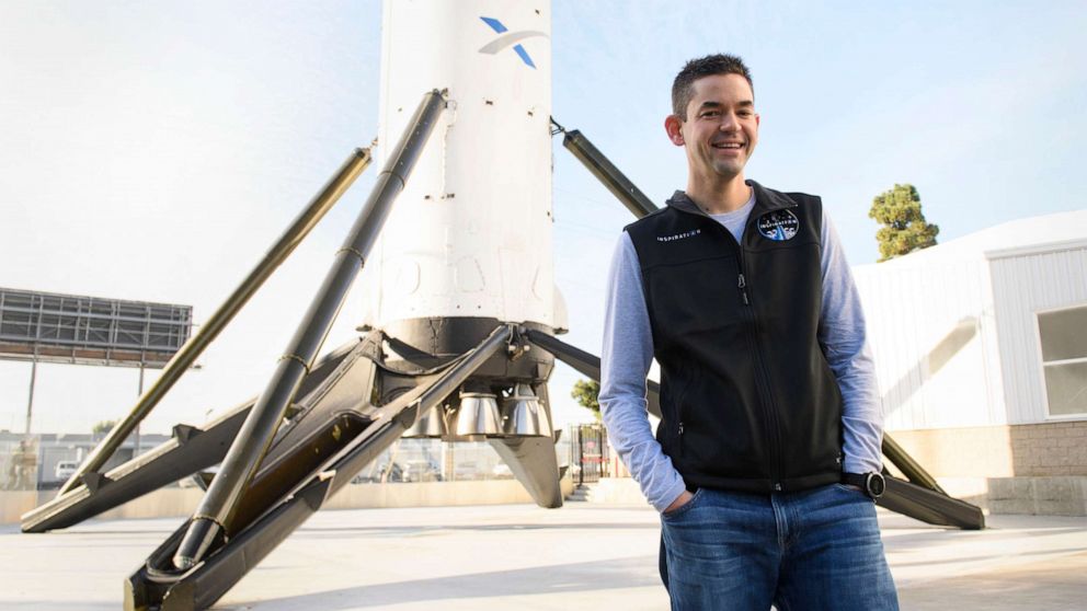 PHOTO: Inspiration4 mission commander Jared Isaacman, founder and chief executive officer of Shift4 Payments, stands in front of the recovered first stage of a Falcon 9 rocket at SpaceX, Feb. 2, 2021 in Hawthorne, Calif.