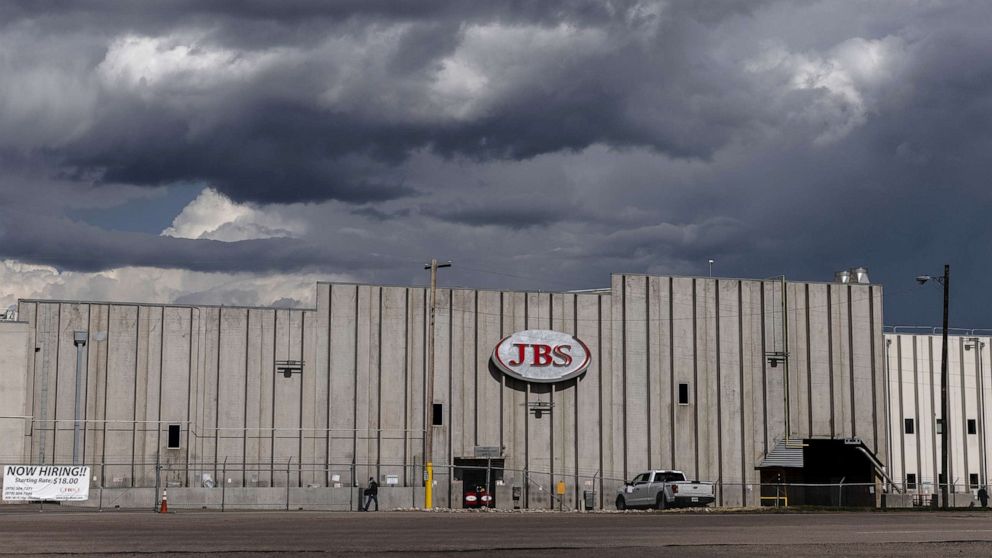 PHOTO: A JBS Processing Plant stands dormant after halting operations on June 1, 2021, in Greeley, Colo.