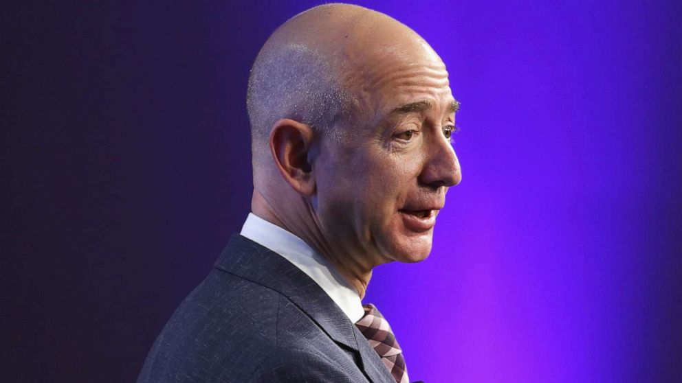 PHOTO: Amazon founder and Washington Post owner Jeff Bezos delivers remarks during the opening ceremony of the media company's new location on Jan. 28, 2016, in Washington.