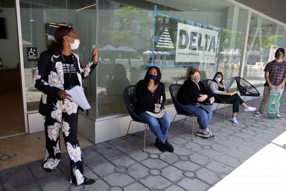 PHOTO: Job seekers attend the Long Beach North Pine Block Job Fair in Long Beach, Calif., May 19, 2021.