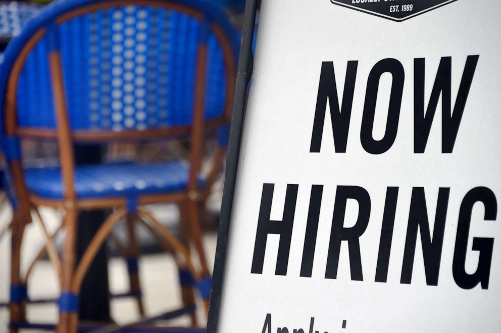PHOTO: A "Now Hiring" sign is displayed at a restaurant in Arlington, Va. amid the coronavirus pandemic, Aug. 4, 2020 