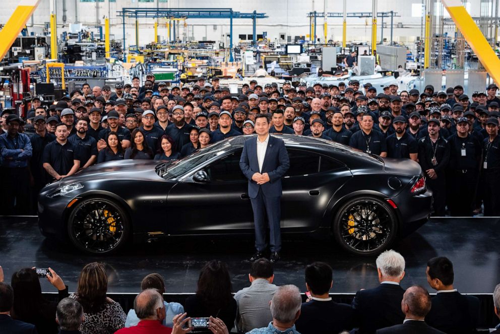 PHOTO: Dr. Lance Zhou, CEO of Karma Automotive, presenting the first Revero car at the company's Customization & Innovation Center in Moreno Valley, California. 