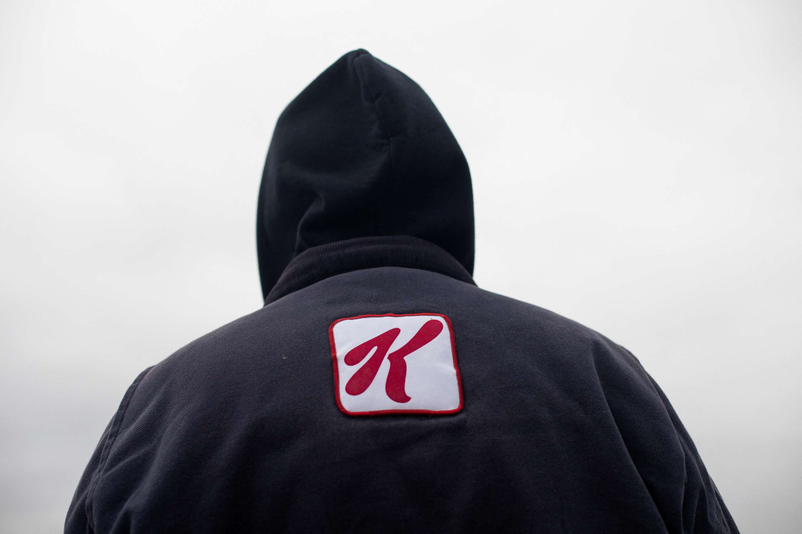 PHOTO: Travis Huffman, 13-year employee, wears a Kellogg jacket as he joins striking workers picketing outside of Kellogg Co. at the Porter Street plant in Battle Creek, Mich., Dec. 11, 2021.