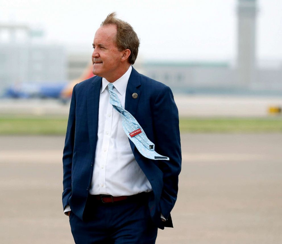 PHOTO: Texas' Attorney General Ken Paxton waits on the flight line for the arrival of Vice President Mike Pence at Love Field in Dallas, June 28, 2020.